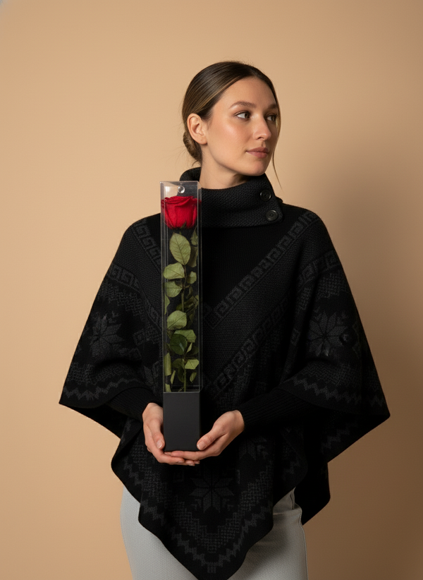 Torso wearing Black Jaguar poncho with rose